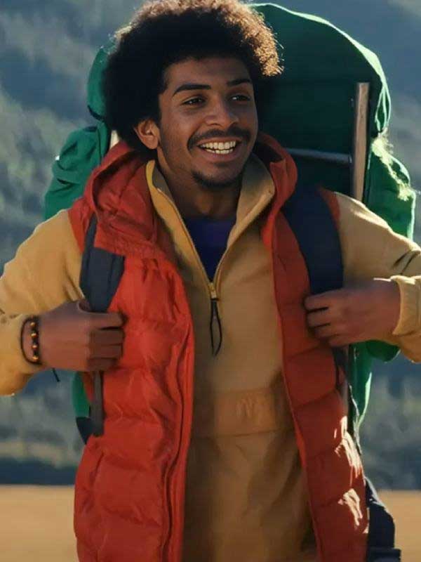 Theo Shakes Film Bookworm 2024 Reginald Orange Puffer Vest