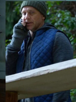 murder-in-a-small-town-2024-gordon-murphy-blue-puffer-vest-1